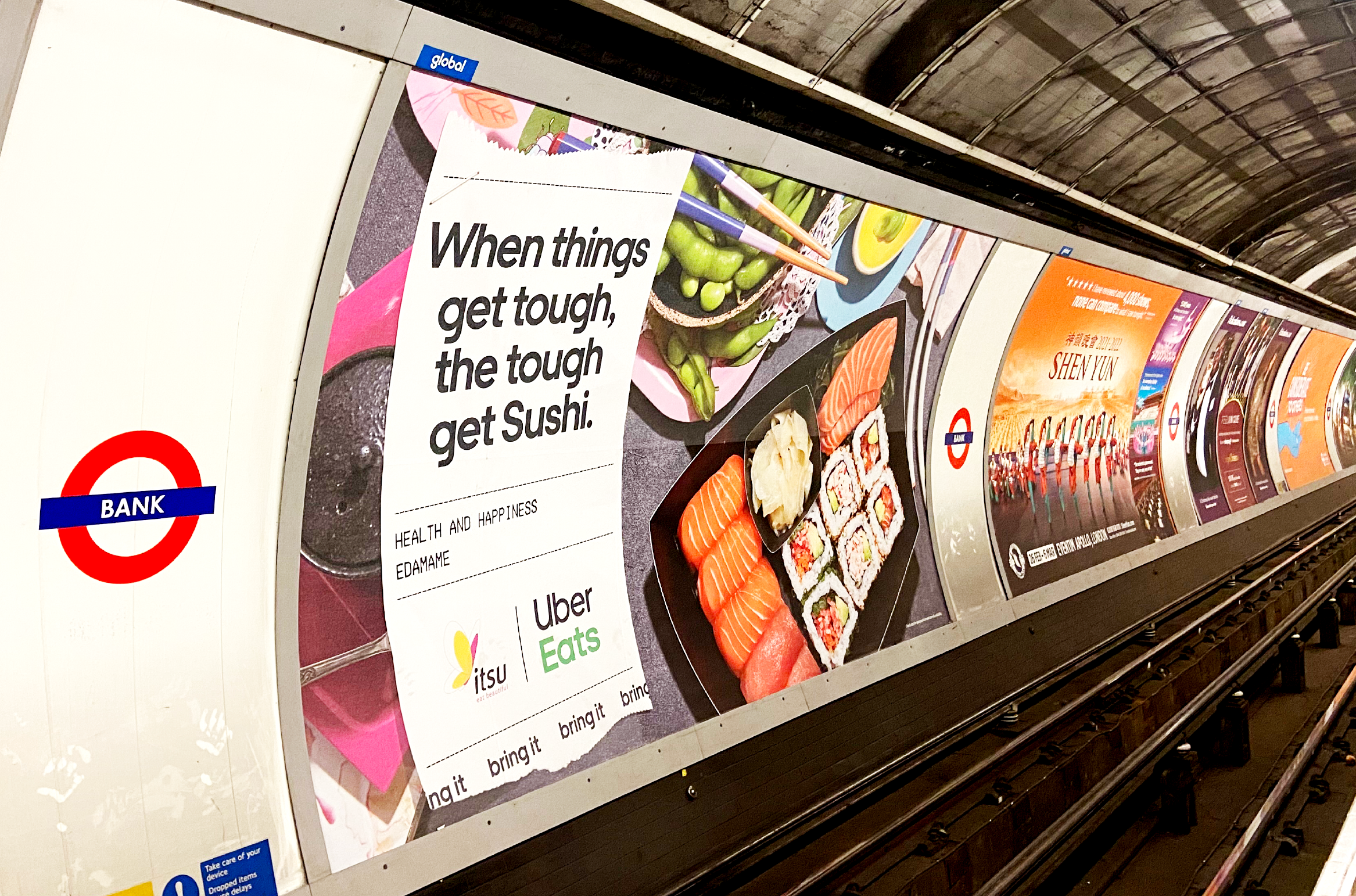 Photo of london underground platform adverts